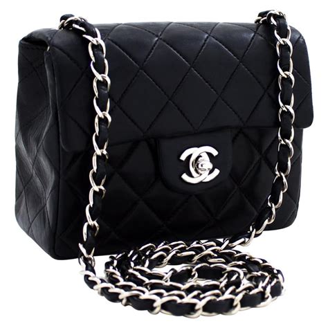 black chanel bag with silver chain|black chanel bag with gold chain.